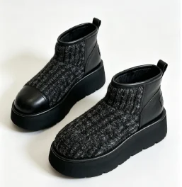 Black knit and leather winter boots