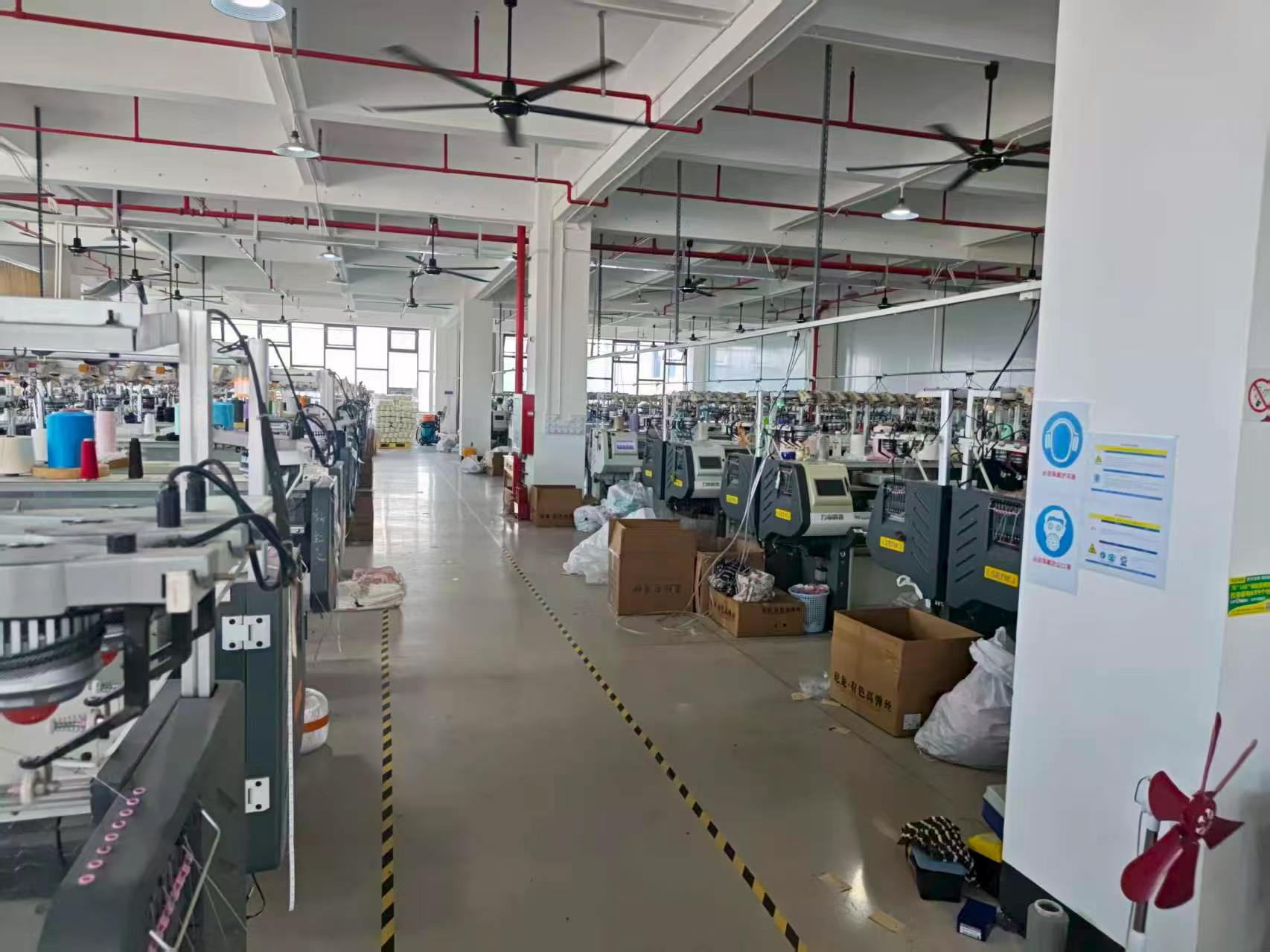 Computerized knitwear production workshop in Dongguan