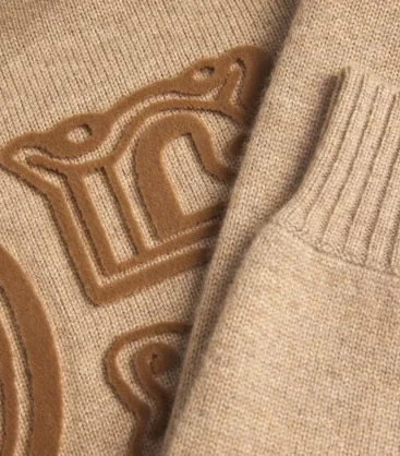 Sweater embroidery and surface detail
