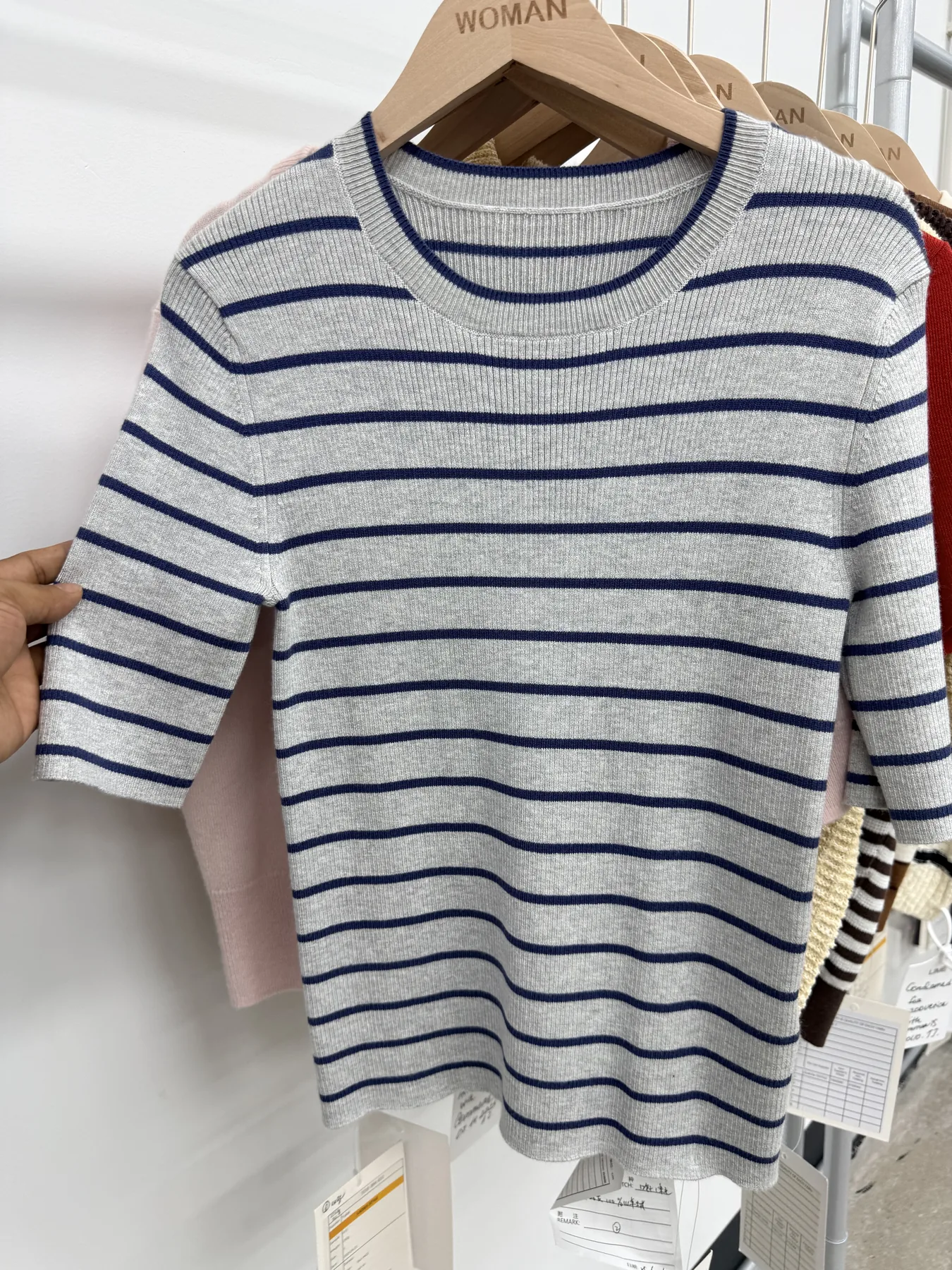 Striped custom knitwear sample showing contrasting yarn colours and rib details